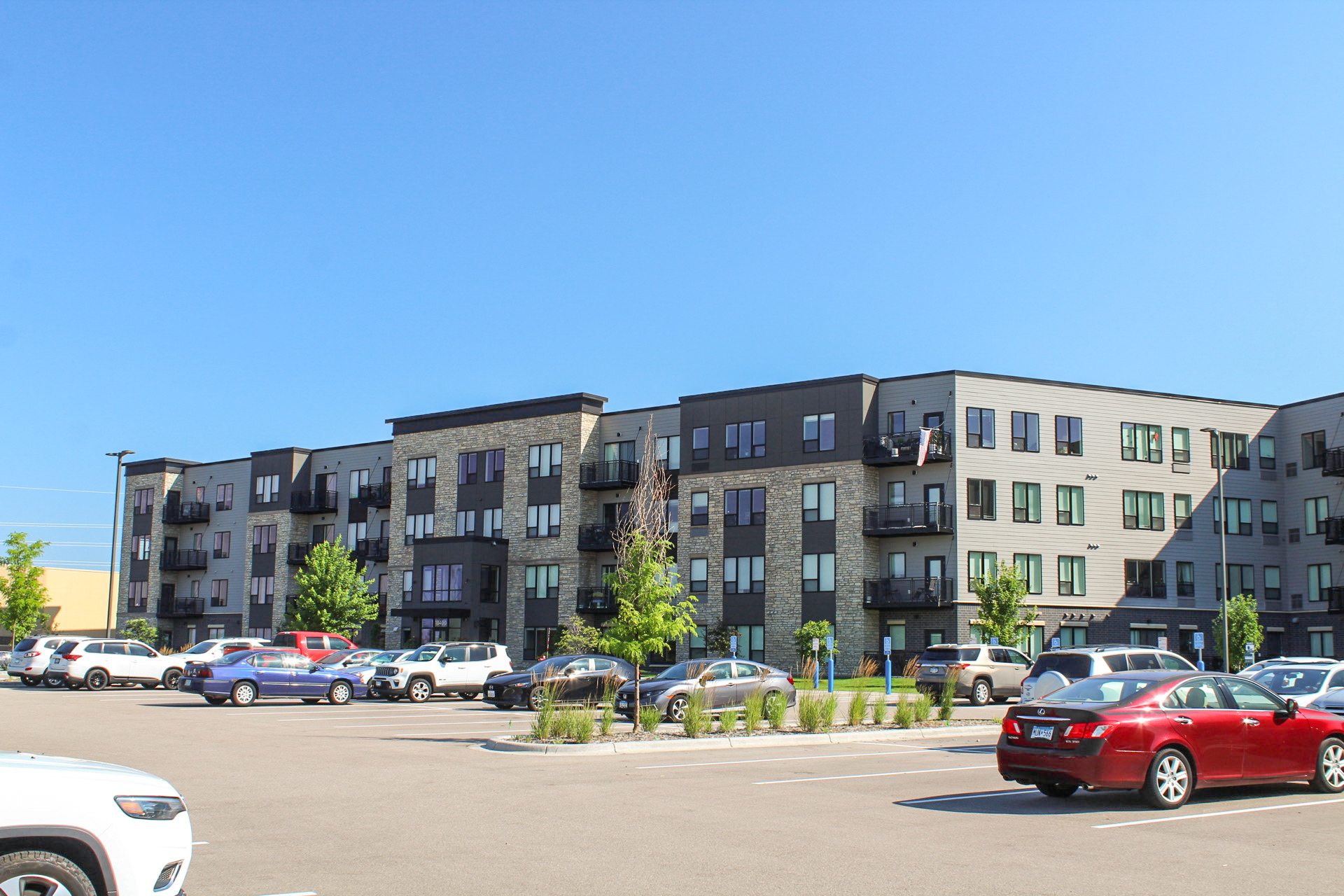 Northlake Loft Apartments Exterior of Building and parking Lot.