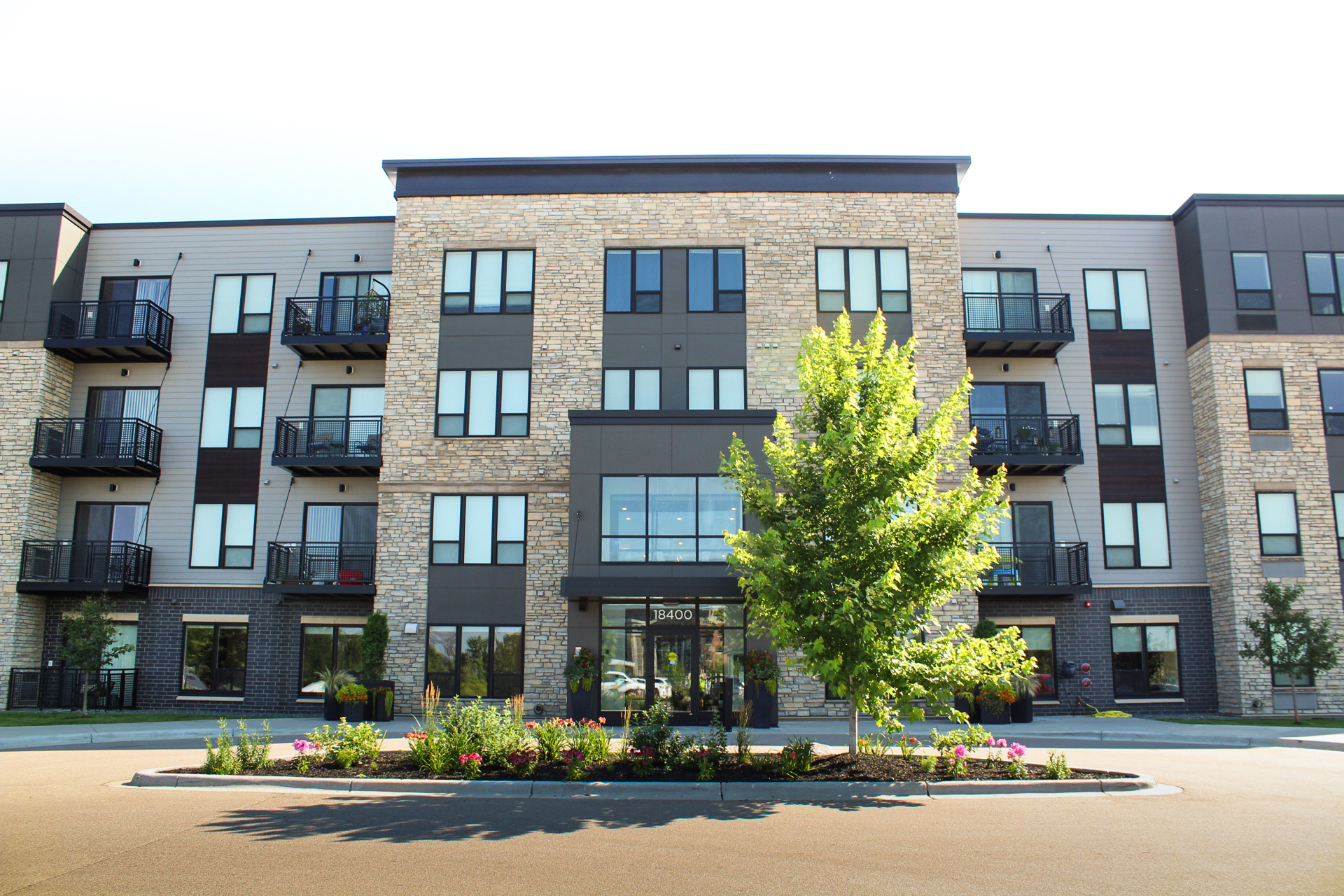 Northlake Loft Apartments Exterior of Building and parking Lot.